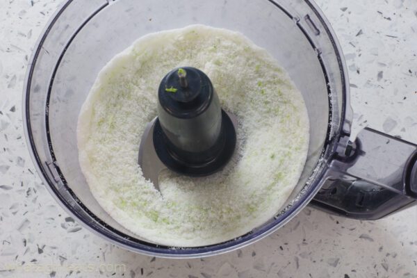 sugar and zest in food processor.