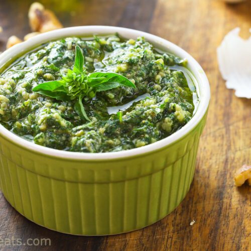 walnut pesto recipe in green container.