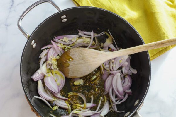 sauteeing shallots.