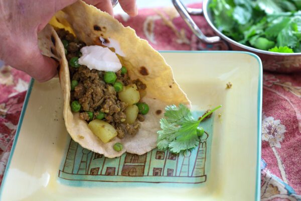 ground beef curry in roti.