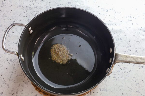 oil and cumin seeds.