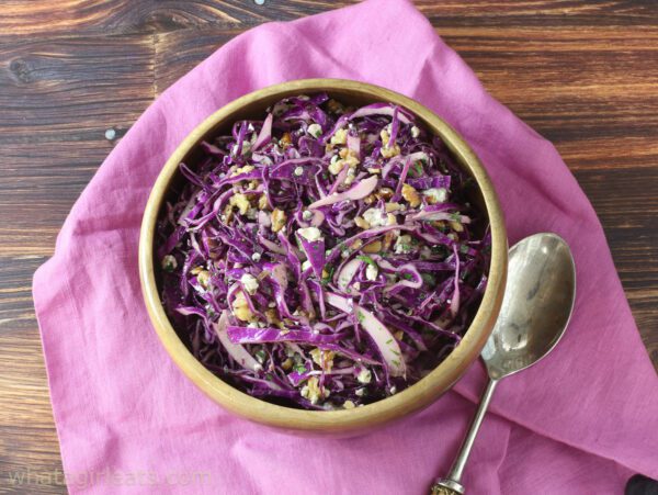 red cabbage slaw top shot on purple napkin.