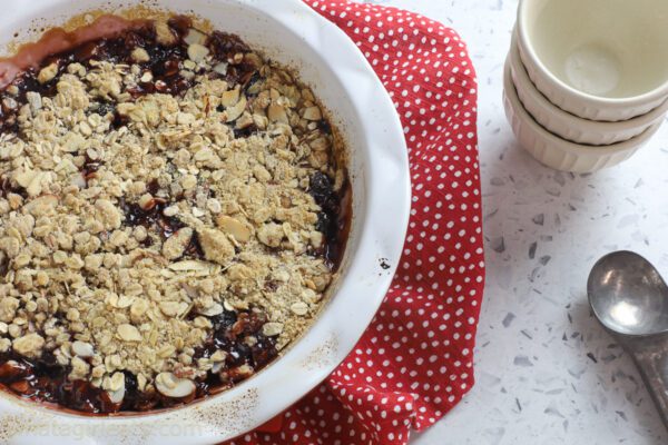 cherry crisp in pie dish.