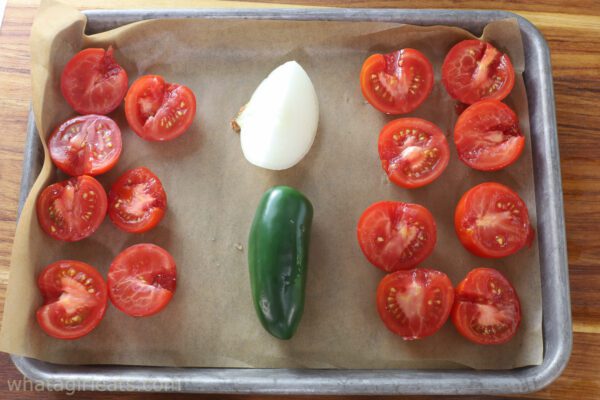 tomatoes and jalapeno on sheet pan.