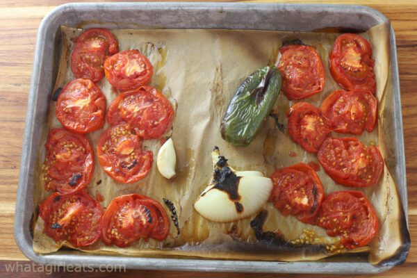 charred veggies on sheet pan.