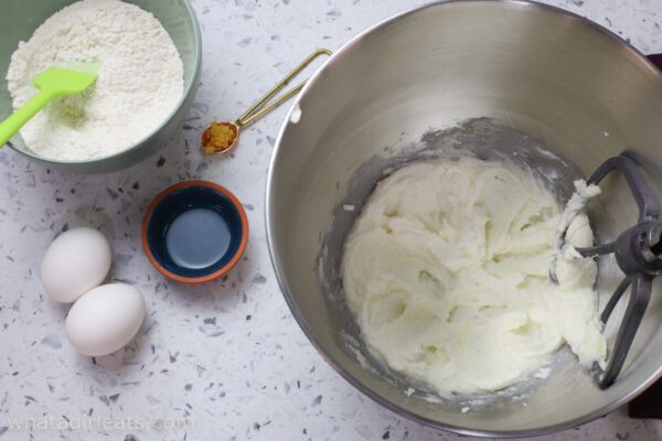 beating sugar and butter in bowl beating sugar and butter.