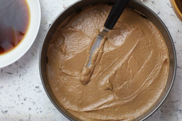 spreading mascarpone layer.