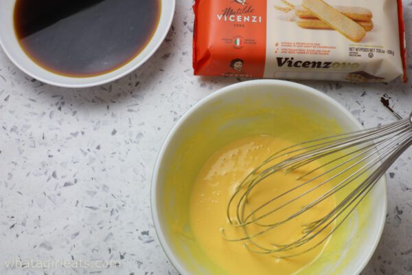 whisking eggs and sugar whisking egg yolks and sugar.