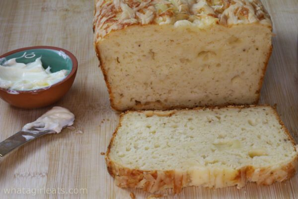 cheese bread on board with butter.