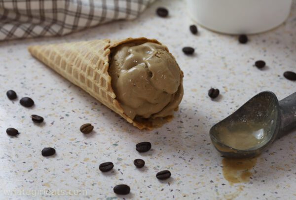 Coffee gelato in waffle cone.
