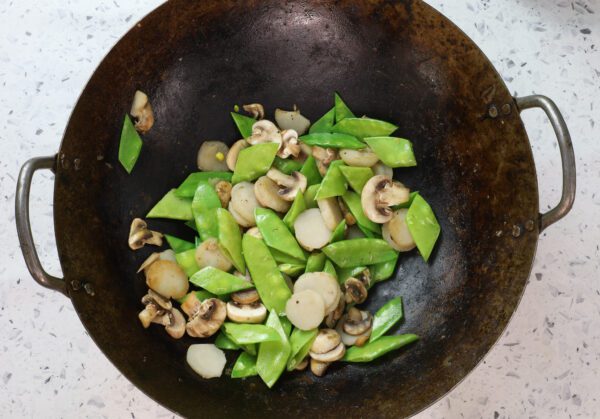 sauteeing veggies in lettuce wraps.