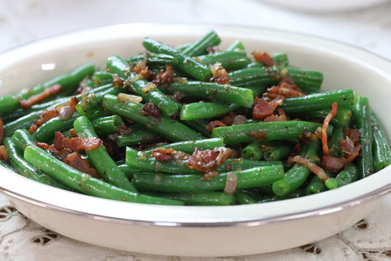 Green beans with bacon closeup.
