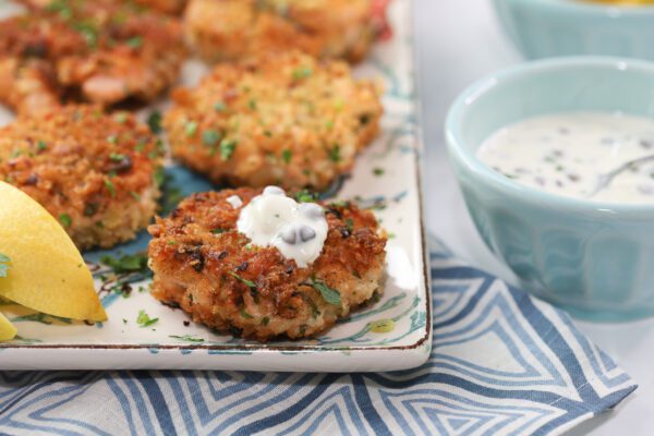 Salmon cakes on platter.