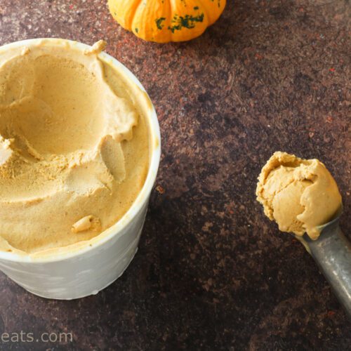 pumpkin spice ice cream top shot with scoop.